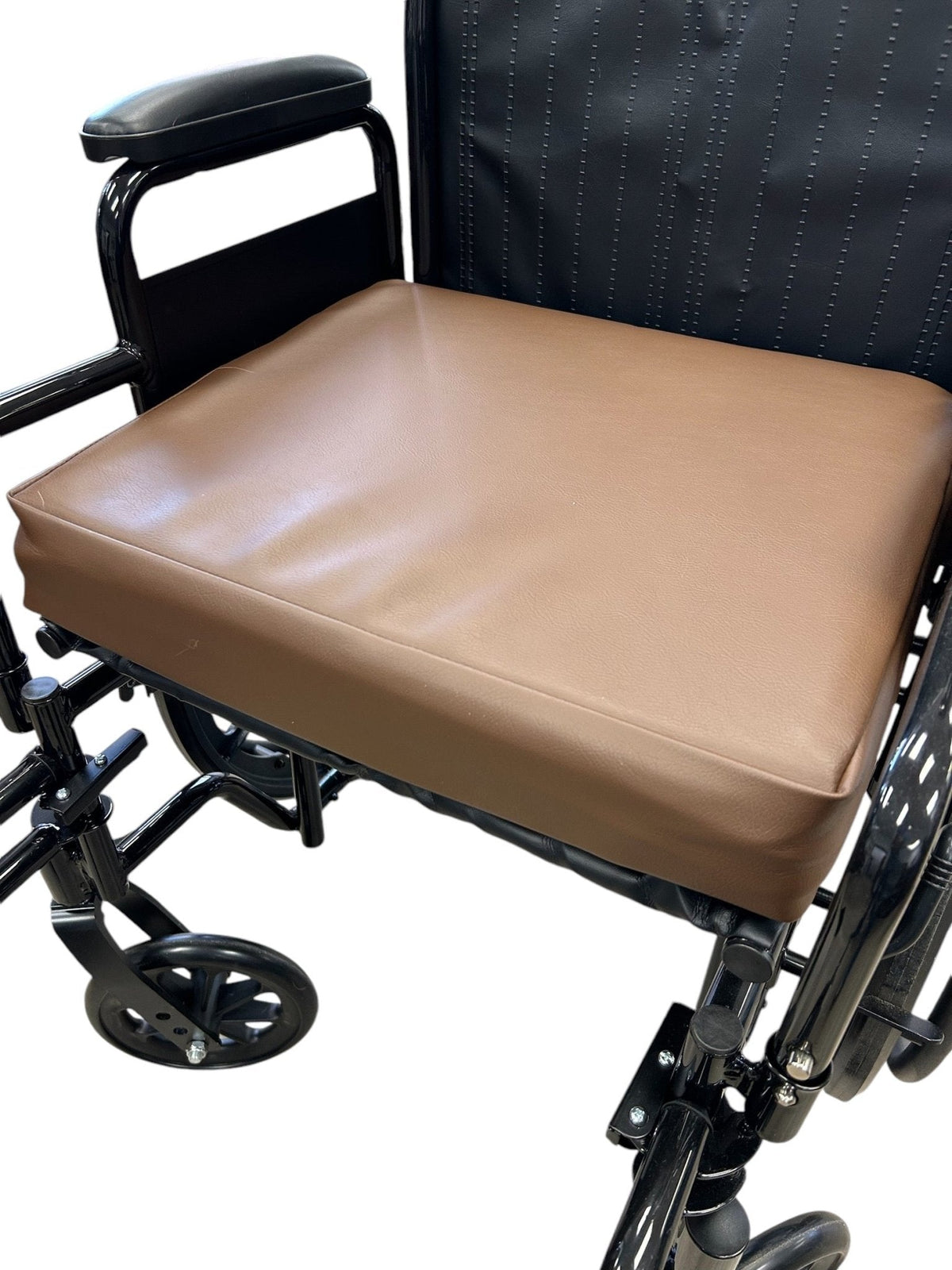Wheelchair seat cushion with leather cover